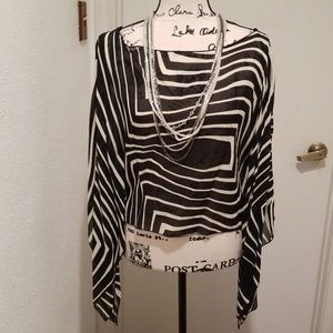 ✔Asymmetrical Sleeve Top